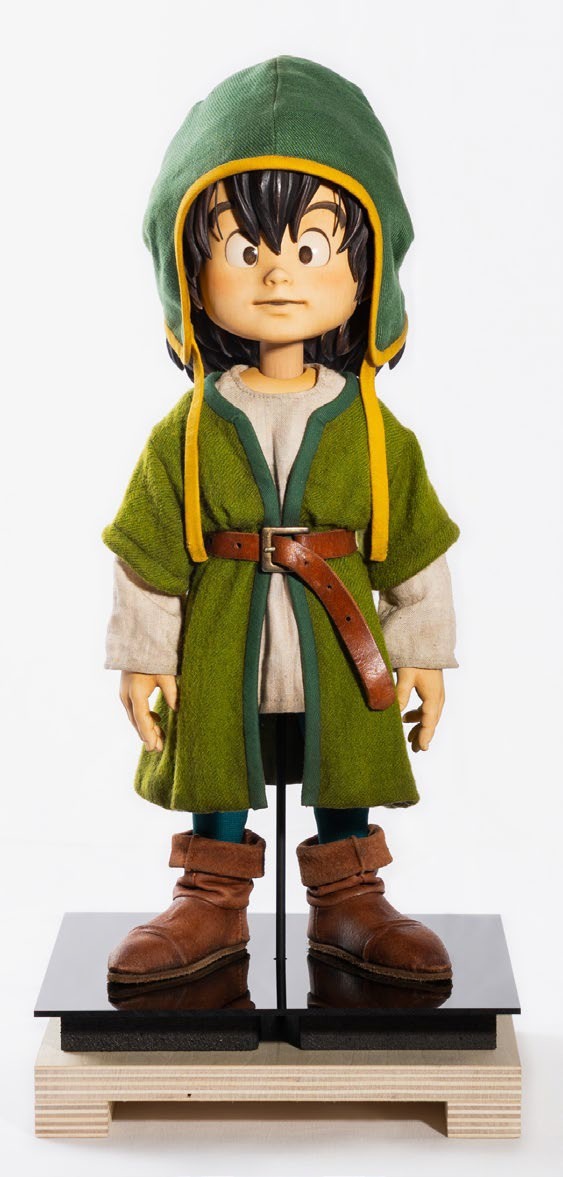 夥伴角色的遊戲 CG(左),是藉由掃描真實製作的大型人偶(右)製作的。 image