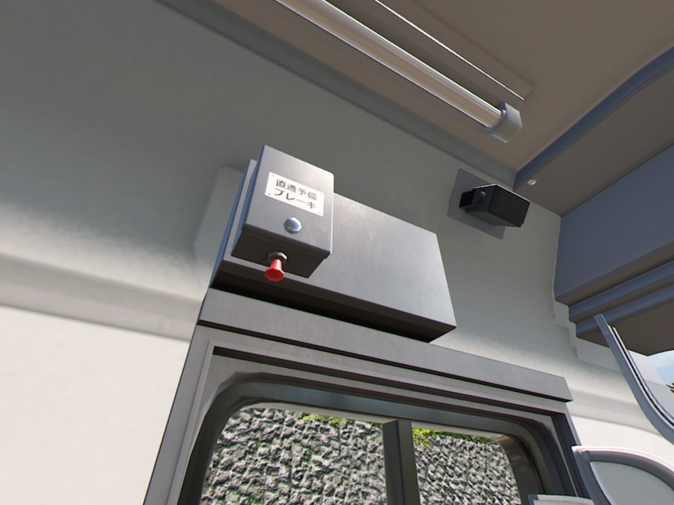 在駕駛席裡四處張望,就可以發現像是腳邊的話筒與頭上的「直通預備煞車」等不同要素 image